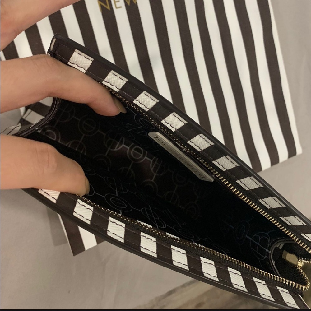 Beautiful leather centennial stripes Henri Bendel makeup/clutch bag